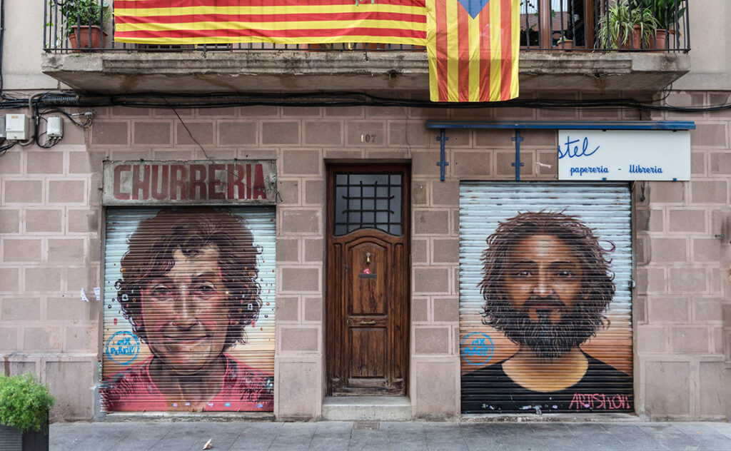 バルセロナ(Barcelona) バルセロナのストリートアート(street art)グラシア地区にある老舗チュレリアのシャッターに描かれた肖像画